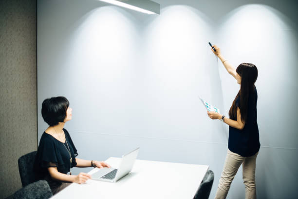 istock Businesswoman preparing presentation for management board 683061214
