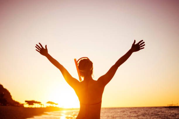 istock Woman open arms before diving 683073384