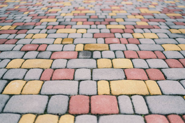 istock Walkway near a private house lined with colored blocks 683074026