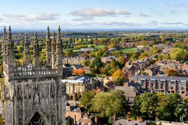 View of church spires and the city of York, England from atop York Minster