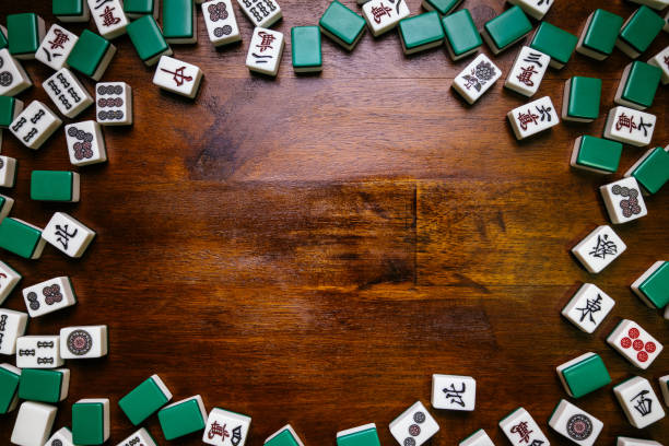 istock Full of Mahjong tiles game on darkwood table background 683077602