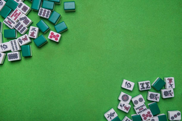 istock Full of Mahjong tiles game on green background 683077694