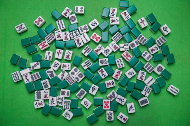 istock Full of Mahjong tiles game on green background 683077712