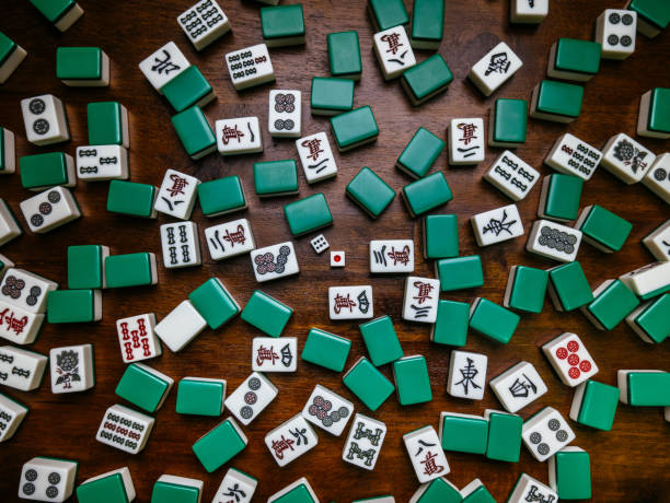 istock Full of Mahjong tiles game on darkwood table background 683077798