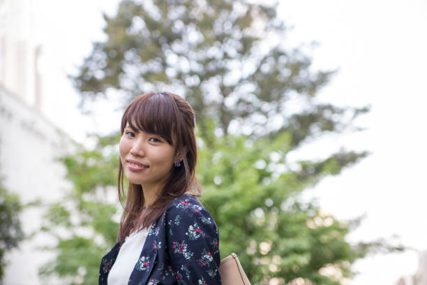 istock Cute woman walking in the city 683097964
