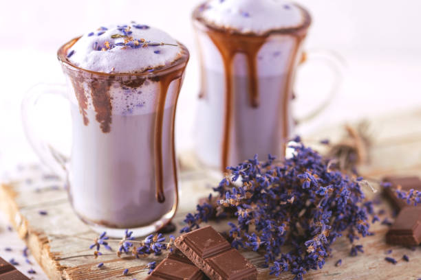 cappuccino with lavender and chocolate syrup and flowers - military canteen imagens e fotografias de stock
