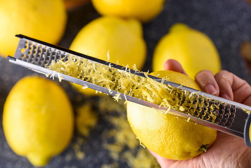Hand zesting lemon