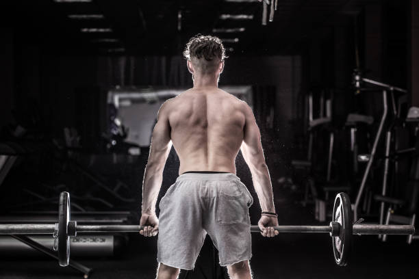 istock Sports man raises the bar 683168846