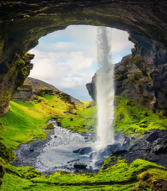 Photo of Colorful morning view from the middle of Kvernufoss waterfall