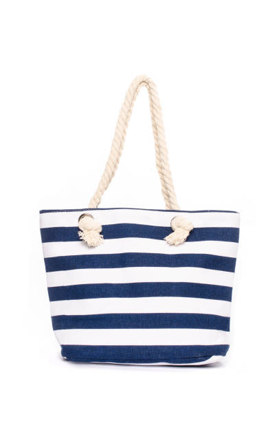 istock Beach striped handbag isolated on white 683181226