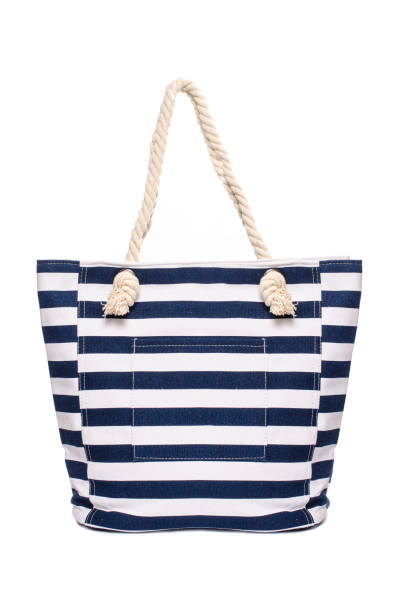 istock Beach striped handbag isolated on white 683181284