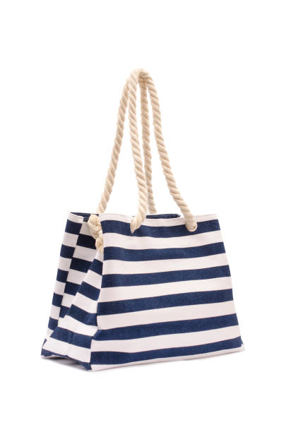 istock Beach striped handbag isolated on white 683181328