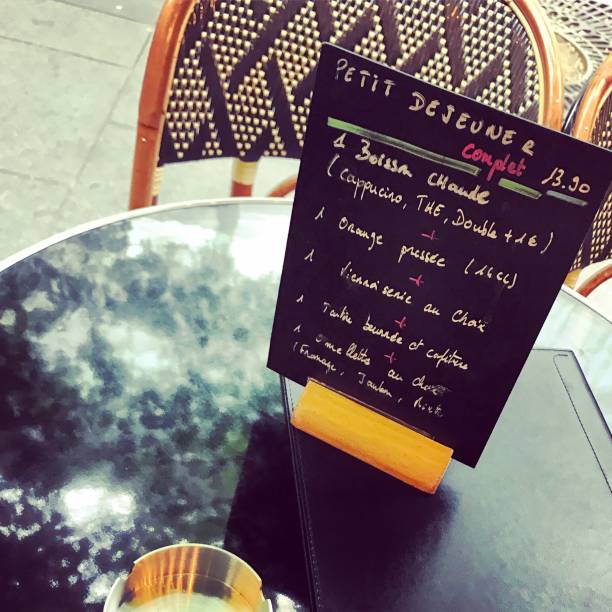 istock Breakfast menu displayed on a table of Paris cafe, France 683189104
