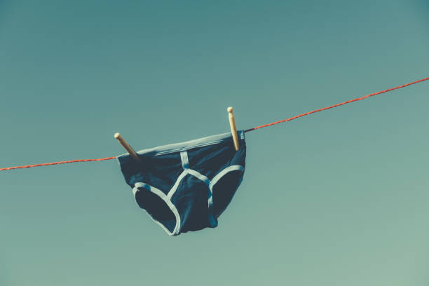 istock Vintage blue Y-front underwear on a washing line. 683195114
