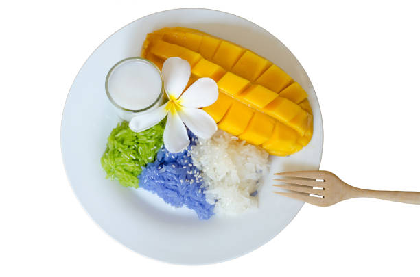 dessert sweet sticky rice with mango coconut milk isolated on white background