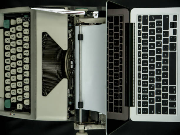 istock Overhead Shot of old typewriter and modern laptop, technological progress concept 683211922