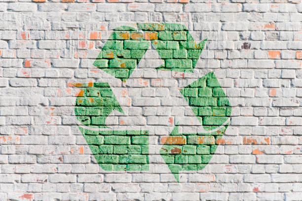 Symbole de recyclage sur le mur de pierre blanche - Photo