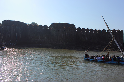 Tourists travelling by ferry to reach Janjira fort. Murud-Janjira fort is the local name for a fort situated on an island near Murud village, in Raigad district of Maharashtra, India. This is the only real fort on an island deep in sea with a huge size.