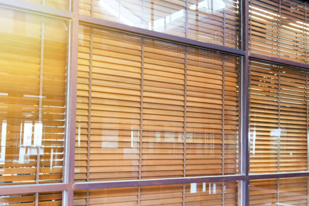 istock wooden blind behind glass window 683212476