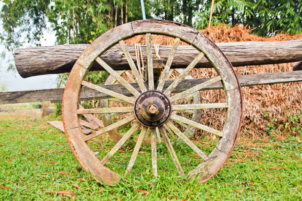 old wooden cart wheel old wooden cart wheel chuck wagon stock pictures, royalty-free photos & images