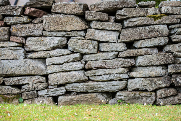 istock Backdrop of an old and weathered stone wall 683215156