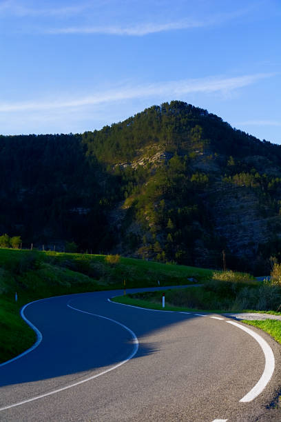 Two adult males enjoy an early morning road bicycle ride in British Columbia, Canada.