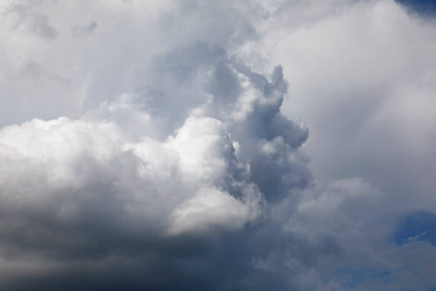 Aeolus, god of the winds Cumulus clouds which look like human side-face like Aeolus, god of the winds. gewitter stock pictures, royalty-free photos & images