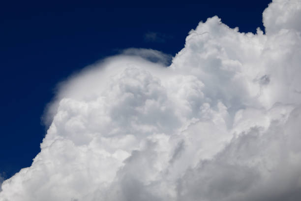 Heavy cumulus clouds over Cologne, Germany North atlantic cyclone with heavy cumulus clouds over Cologne, Germany. gewitter stock pictures, royalty-free photos & images