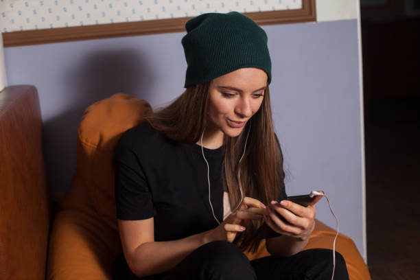 istock Woman listening music 683225806