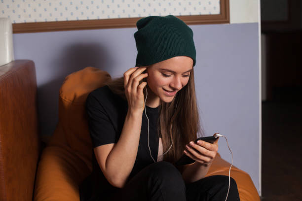istock Woman listening music 683225928