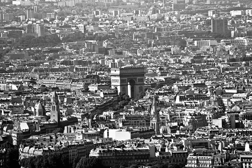 Black and white photo of Paris, France. Aerial view on the Eiffel Tower, Arc de Triomphe, Les Invalides etc.