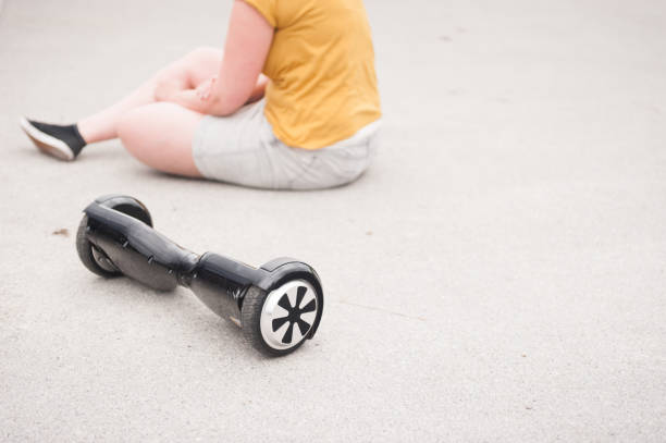 istock Hoverboard and injured person in the background 683243722