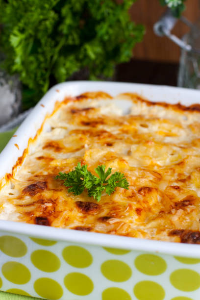 istock Potato gratin in ceramic form, top view 683250354