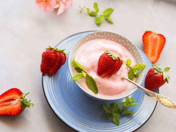 istock Home made strawberry ice cream in bowl 683254292