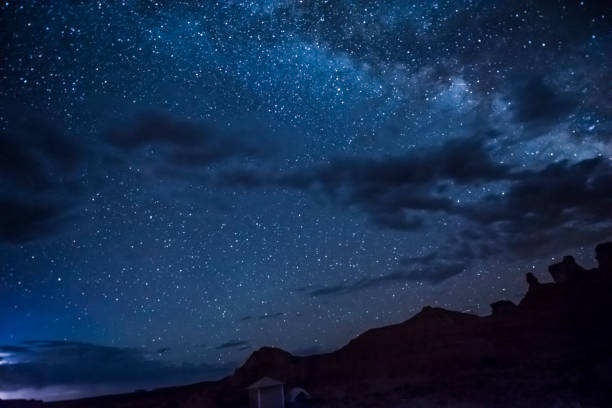 night sky with milky way, clouds, canyons and campground - valley storm thunderstorm mountain imagens e fotografias de stock