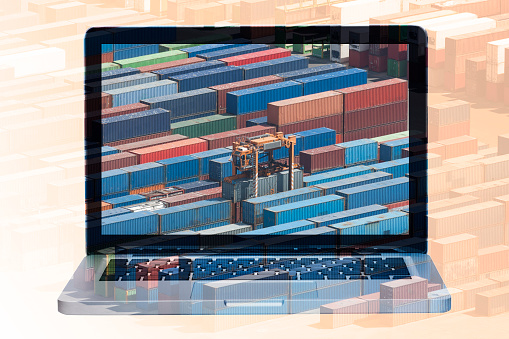 multiple exposure laptop, all logos on cargo containers removed.