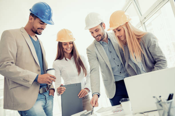 istock Positive business team working at office 683277598