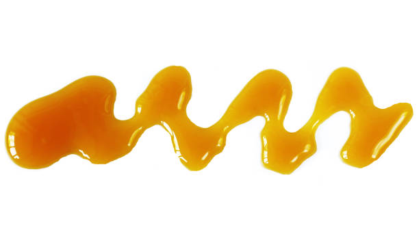 istock Sweet natural caramel syrup on a white background 683287682