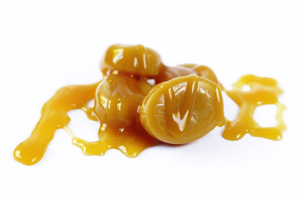 istock Sweet natural caramel syrup on a white background 683287972