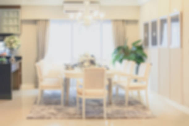 istock blur image of modern luxury dining room interior. 683288128