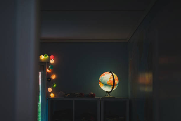 istock Shining Globe lamp in room planet earth 683291118