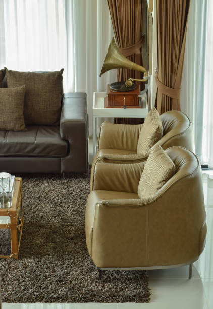 istock Light brown leather armchairs in classic living area 683293638