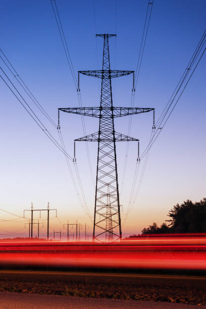 istock Pylon and transmission power line in sunset. 683294204