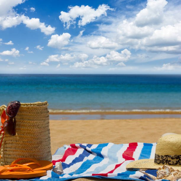 istock towel and sunbathing accessories on  bec 683296722