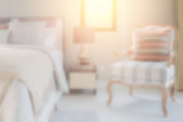istock blurred classic style bedding with easy lounge chair in cozy bedroom for background 683296936