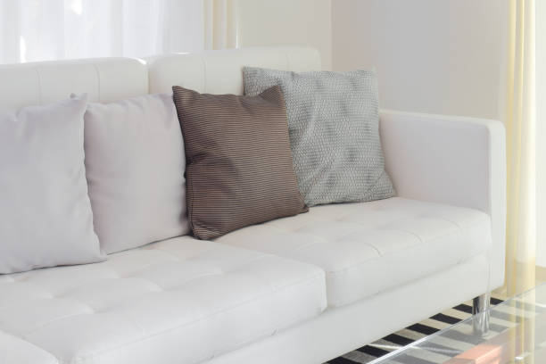 istock Pillows on white sofa in living room 683296960