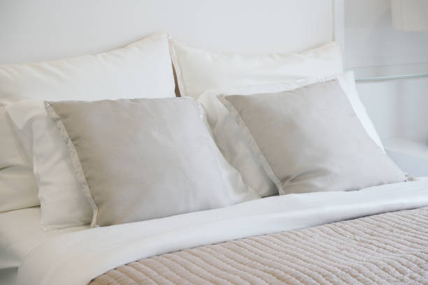 istock Light gray pillow setting on bed in nice vibe bedroom modern interior style 683297152
