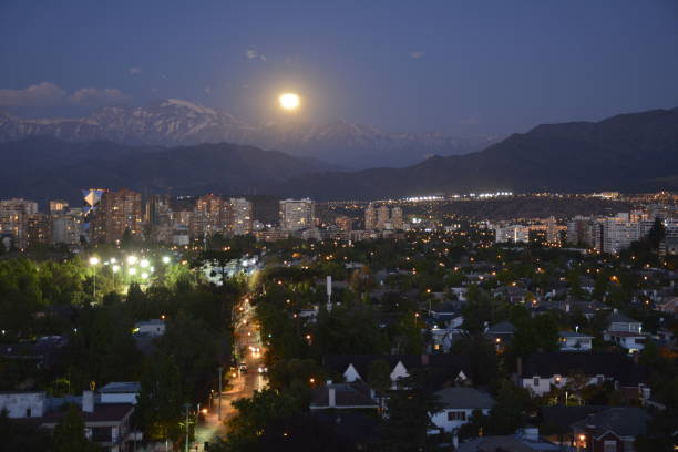 istock Full Moon rising at mount Andes in Santiago, Chile 683304034