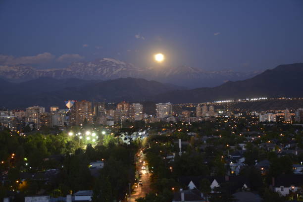 istock Full Moon rising at mount Andes in Santiago, Chile 683304036