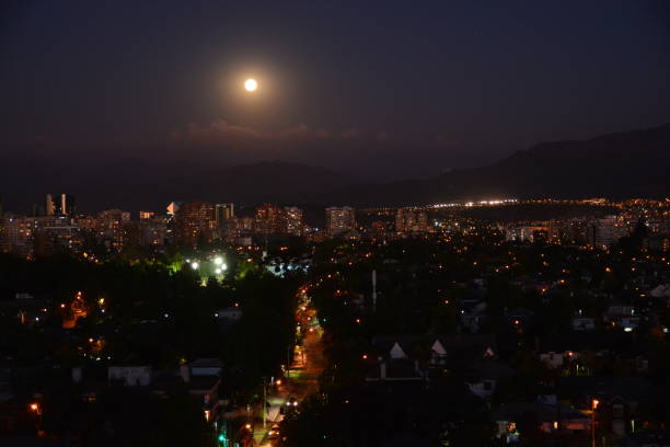 istock Full Moon rising at mount Andes in Santiago, Chile 683304218